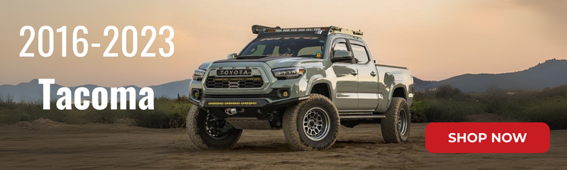 Green Toyota Tacoma overland with exhaust system